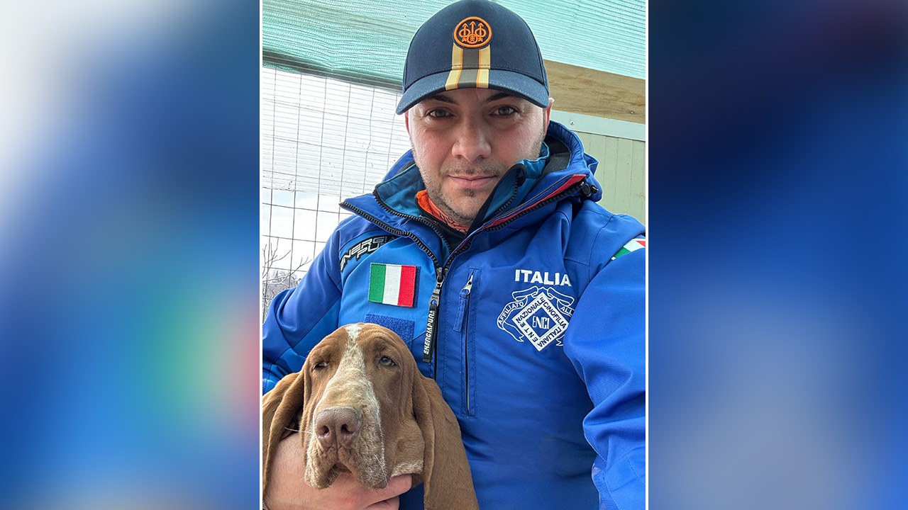 cane con padrone